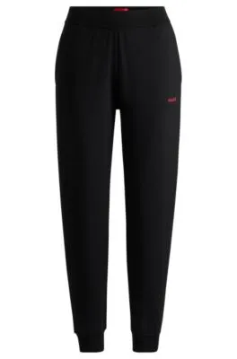 Relaxed-fit tracksuit bottoms with printed logo